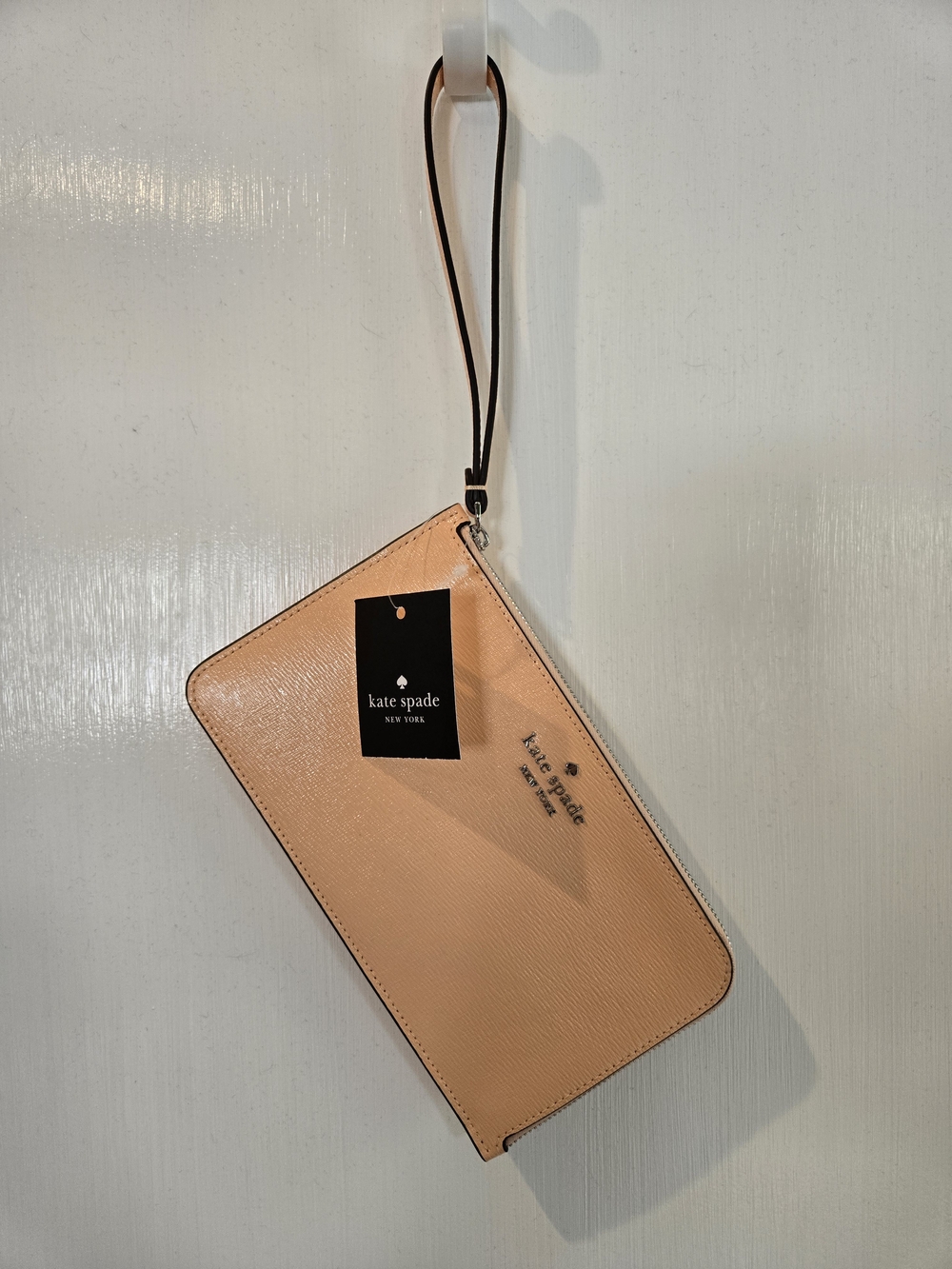 kate spade Peach Saffiano Leather Wristlet with Dark Contrast Strap